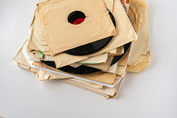 a stack of old vinyl discs, abstract retro music collection from the 80s, disco jazz blues sounds