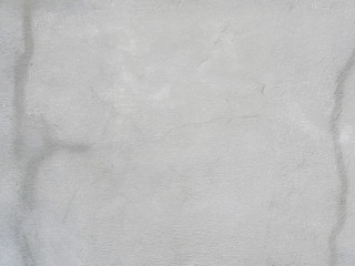 Cement texture with a wet pattern grey background 