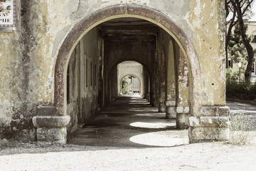 Fototapeta na wymiar beautiful arches of an old abandoned building in europe