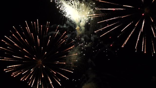 Slow Motion Tilt Up Fireworks Exploding