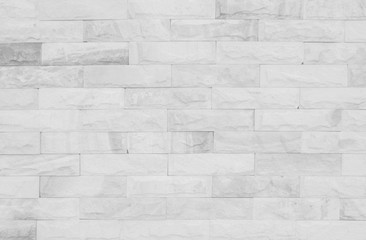 Medieval natural stone wall texture background or boundary the rock seamless abstract and decor fragment of design vintage wallpaper pattern chipped ancient from white color for interior copy space.