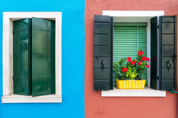 Fototapeta premium vintage wooden window on colorful cement background