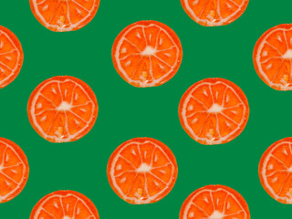 Seamless pattern with orange citrus slices on a green background.