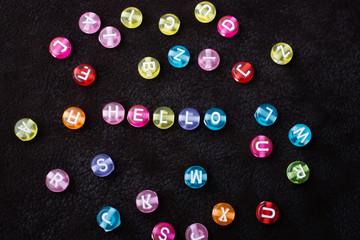 Hello wording with Multi color alphabet letter beads