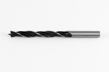 New spiral drill bit for wood on white background close up