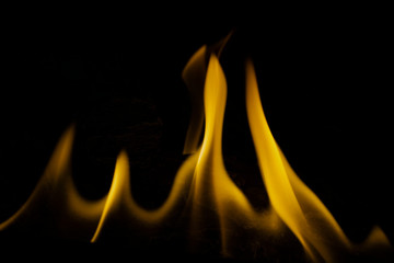 Yellow flames on black background