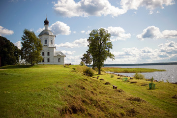Fototapeta na wymiar Church of the Exaltation of the Holy Cross in the Nile Desert. Nilo-Stolobenskaya Pustyn. Is situated on Stolobny Island in Lake Seliger. Tver region, Russia