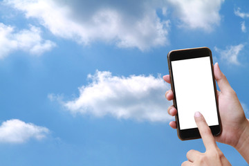 Women holding hands blank smart phone display on sky. Focus on the hand 