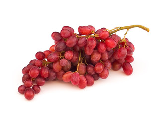 Bunch of ripe sweet red grapes on white background.