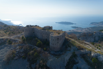 Fototapeta na wymiar aerial view of Kosmac Fortress located on the Budva-Cetinje road, Montenegro.