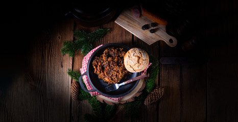 Polish bigos with sausage and dried plum