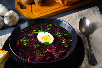 Delicious beetroot borscht with egg