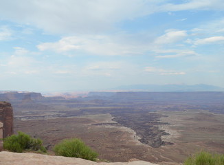 Early Summer in Utah: White Rim, Buck Canyon, Colorado River and La Sal Mountains Seen from Overlook in the Island in the Sky District of Canyonlands National Park