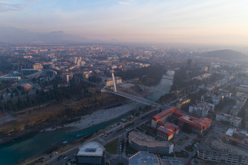 Fototapeta premium aerial view of Millennium bridge over Moraca river in Podgorica