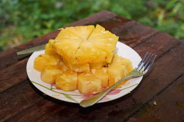 Pineapple collection. Whole and sliced pineapple isolated on white background and blurred background.