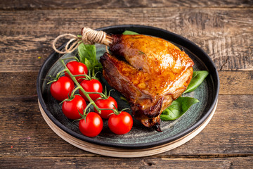 Smoked roasted goose carpaccio on wooden table with garnish green salad © Eugeny