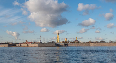 Fototapeta premium Peter and Paul Fortress viewed from Neva river in Saint Petersburg, Russia. The fortress was built in 18 century and is now one of the main attractions in St. Petersburg.