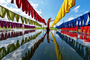 Handcrafted colorful lotus fabrics made from lotus fibers in Inle Lake, Shan State in Myanmar....