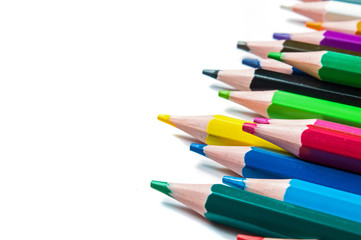 multicolored pencils on a white background.