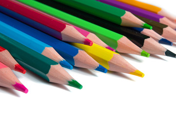 multicolored pencils on a white background.