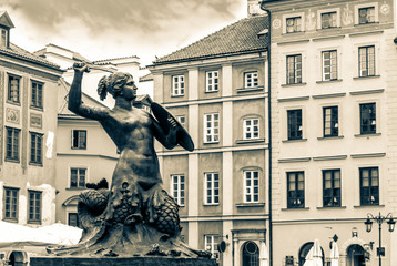 Sculpture in the old town in Warsaw. Old retro vintage style photo. © HappyRichStudio