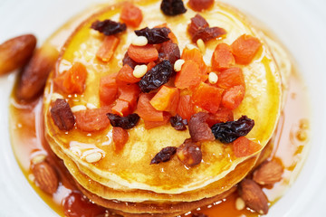 pancakes with nuts, honey and dried apricots