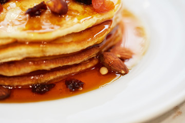 pancakes with nuts, honey and dried apricots
