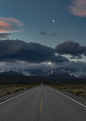 Escape - travelling away from storm over mountains into clear skies