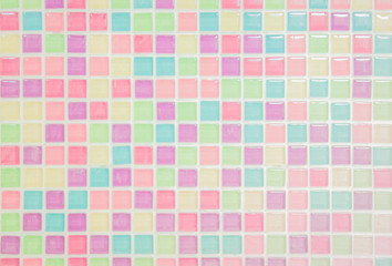 Colorful pastel ceramic wall and floor grid tiles abstract background. Design geometric mosaic texture decoration of the bedroom, Home or office. Simple seamless pattern for backdrop advertising.
