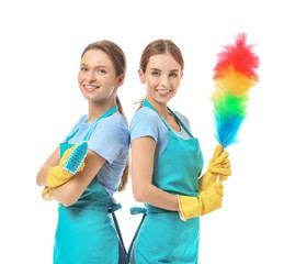 Female janitors on white background