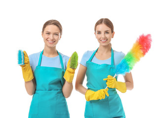 Female janitors on white background