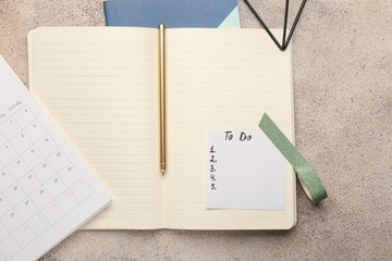 Empty to do list with notebook on table