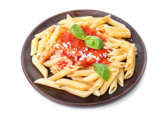Plate with tasty pasta and tomato sauce on white background