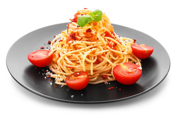 Plate with tasty pasta and tomato sauce on white background
