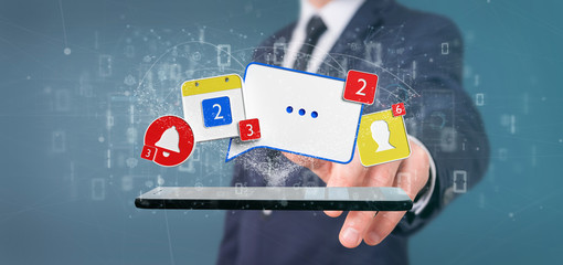 Businessman holding Social network notifications - 3d rendering