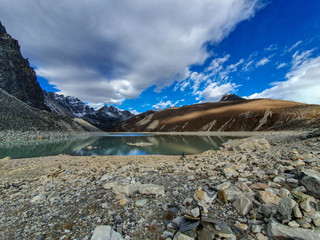Donag Tsho, the fourth Gokyo lake., hills and snow-capped mountains. Sunny day and marvellous blue...