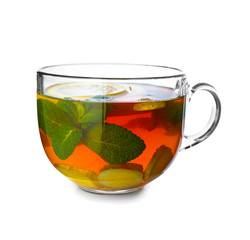Cup of tasty ginger tea on white background