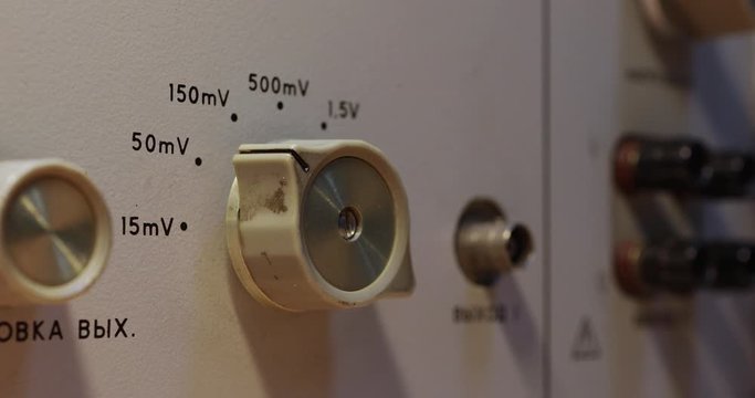 Man changes operation mode of the device by rotating the switch