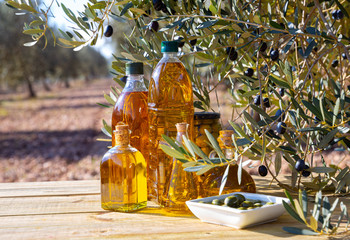 Olive oil in glass decanters and bottles