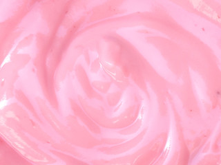 Closeup creamy yogurt strawberry background.