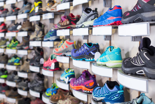 Image of large selection of sport shoes in store.