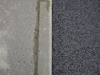 Straßenrand frischer Asphalt Bürgersteig