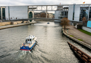 Boat of the Berlin water police on a patrol on the Spree in the government district, Germany