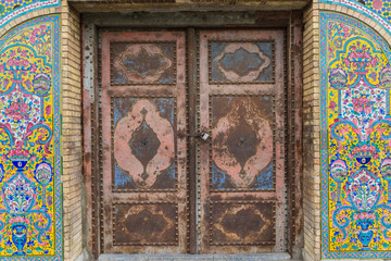 mosaic authentic oriental carvings door in Golestan Palace, Tehran, Iran