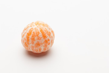 Tangerine orange-skinned sweet fruit of the citrus family.