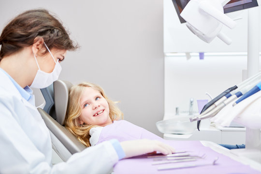 Dentist Or Physician Assistant Treats Child