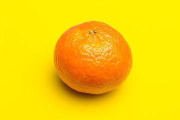 Tangerine orange-skinned sweet fruit of the citrus family.