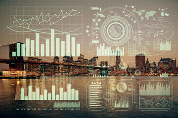 Financial graph on night city scape with tall buildings background double exposure. Analysis concept.