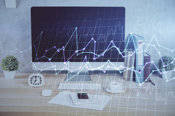 Forex graph hologram on table with computer background. Double exposure. Concept of financial markets.