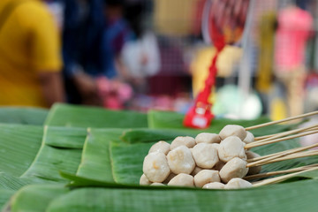 Street food, many kind of food sold in market,  foot path with space for write wording. Dirty unhealthy food caused many kinds of digestive tract infection,